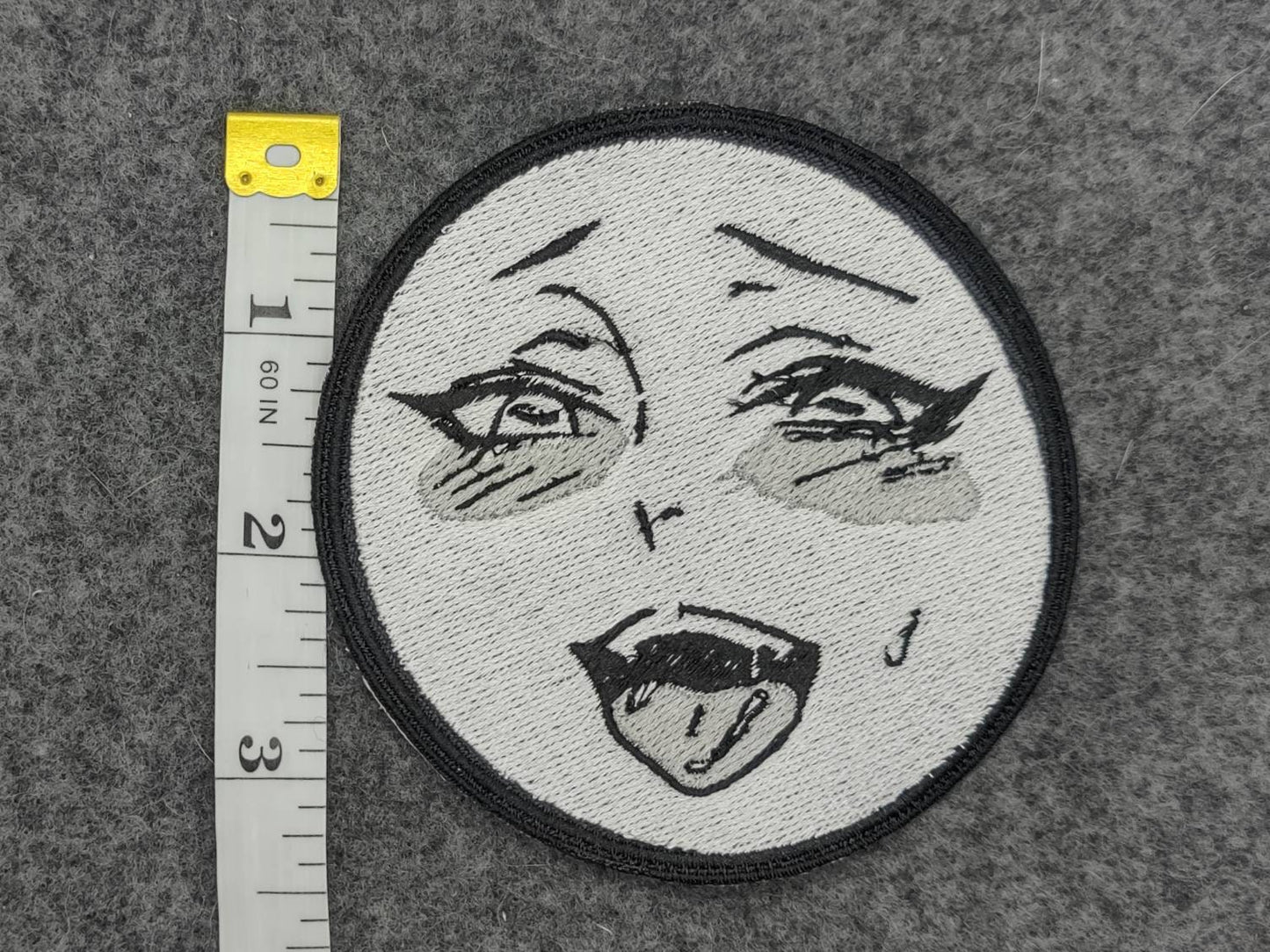 embroidered Ahegao face patch